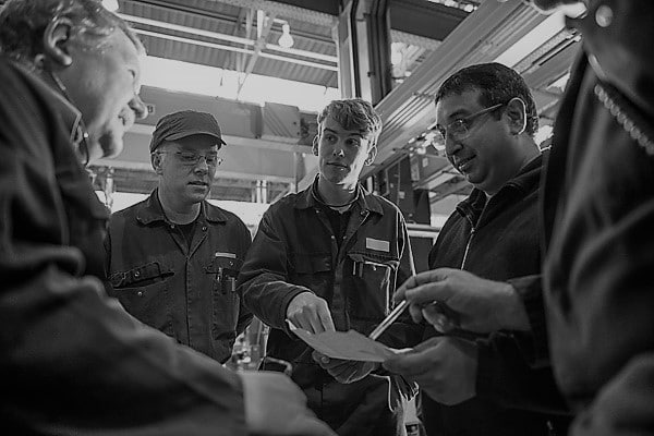 A team discusses a predictive maintenance program.