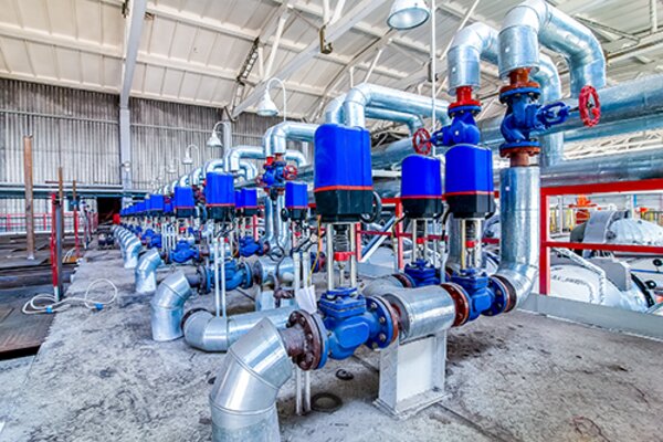 PRUFTECHNIK vibration monitoring systems monitor a a variety of assets in a factory.